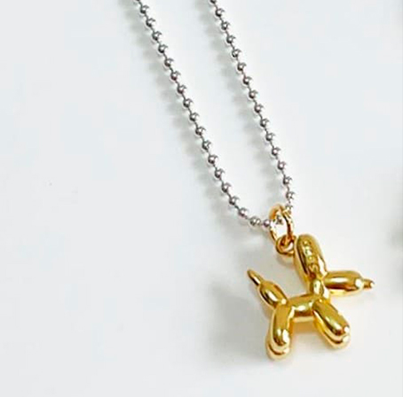 Collar cadena plata bolitas con divertido colgante figura de perro en dorado. Collar cadena plata bolitas con divertido colgante figura de perro en dorado.