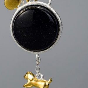 Collar cadena bolitas en plata con pieza gema universo azul y perrito dorado.