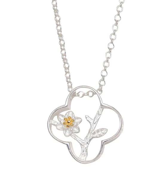 collar gargantilla en plata con girasol en el centro