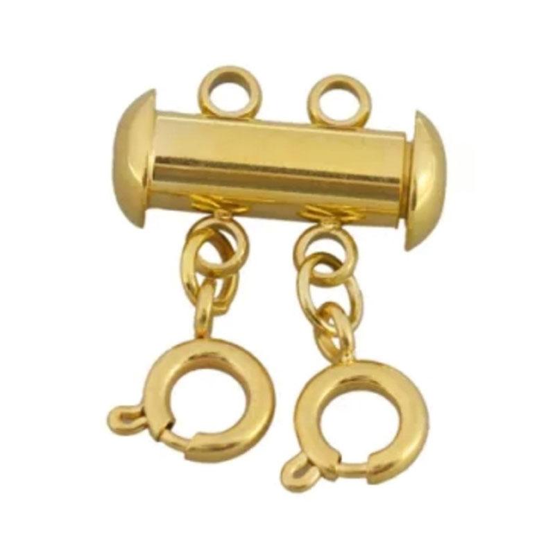 Conector en acero dorado con cierre imán para dos colgantes.