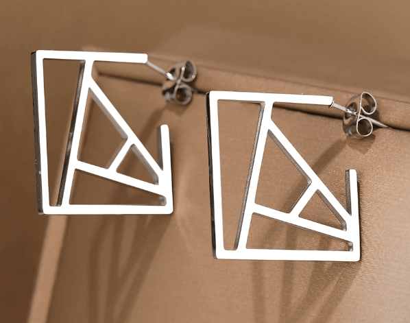 Pendientes acero geométricos