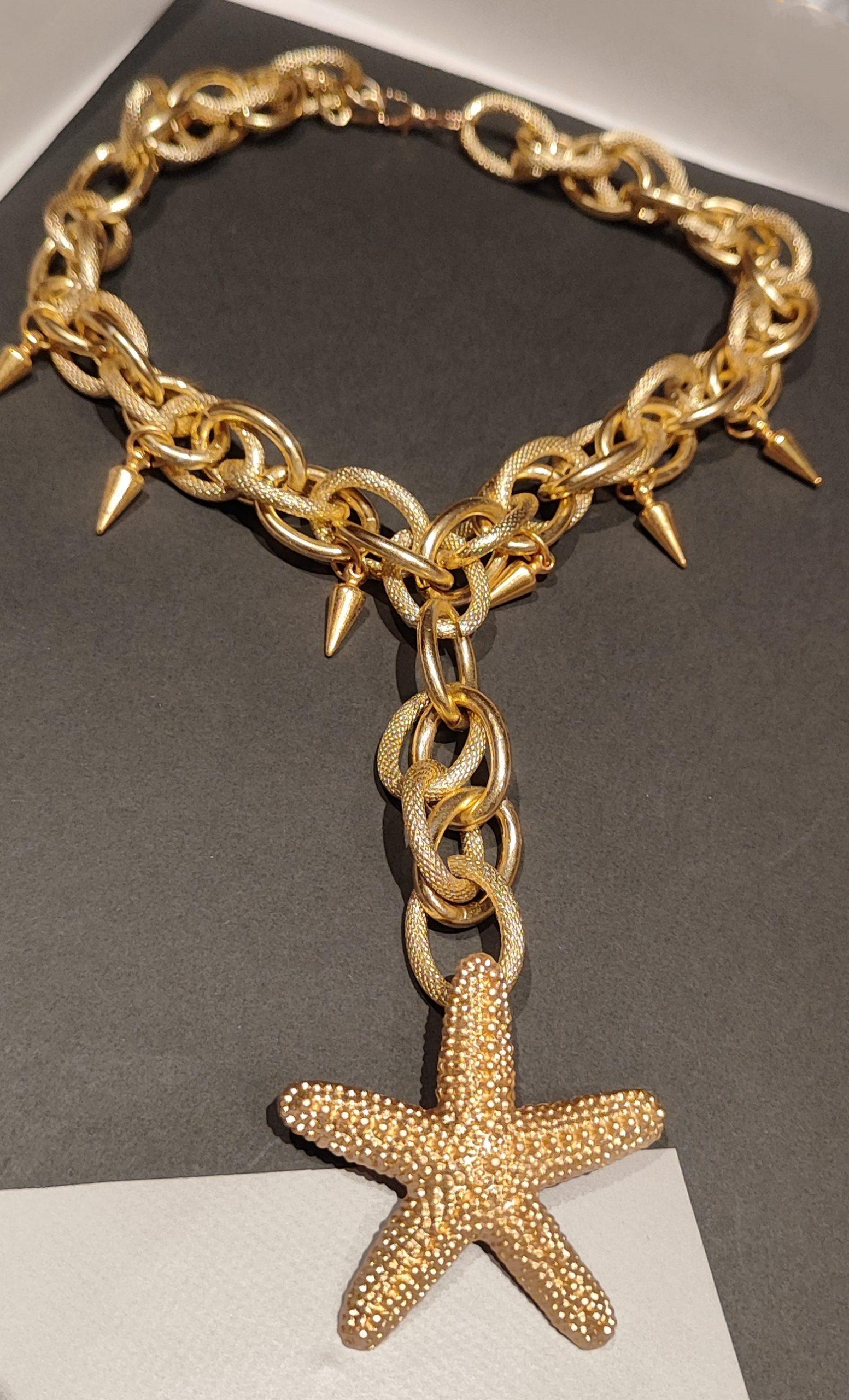 Collar doble cadena en acero dorado con estrella de mar Collar doble cadena en acero dorado con estrella de mar