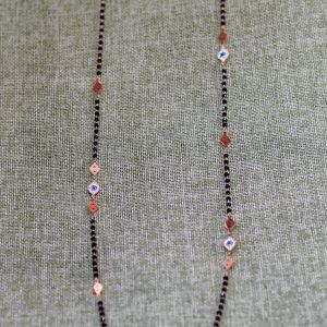 collar largo en acero rosado con ojo turco en circonitas