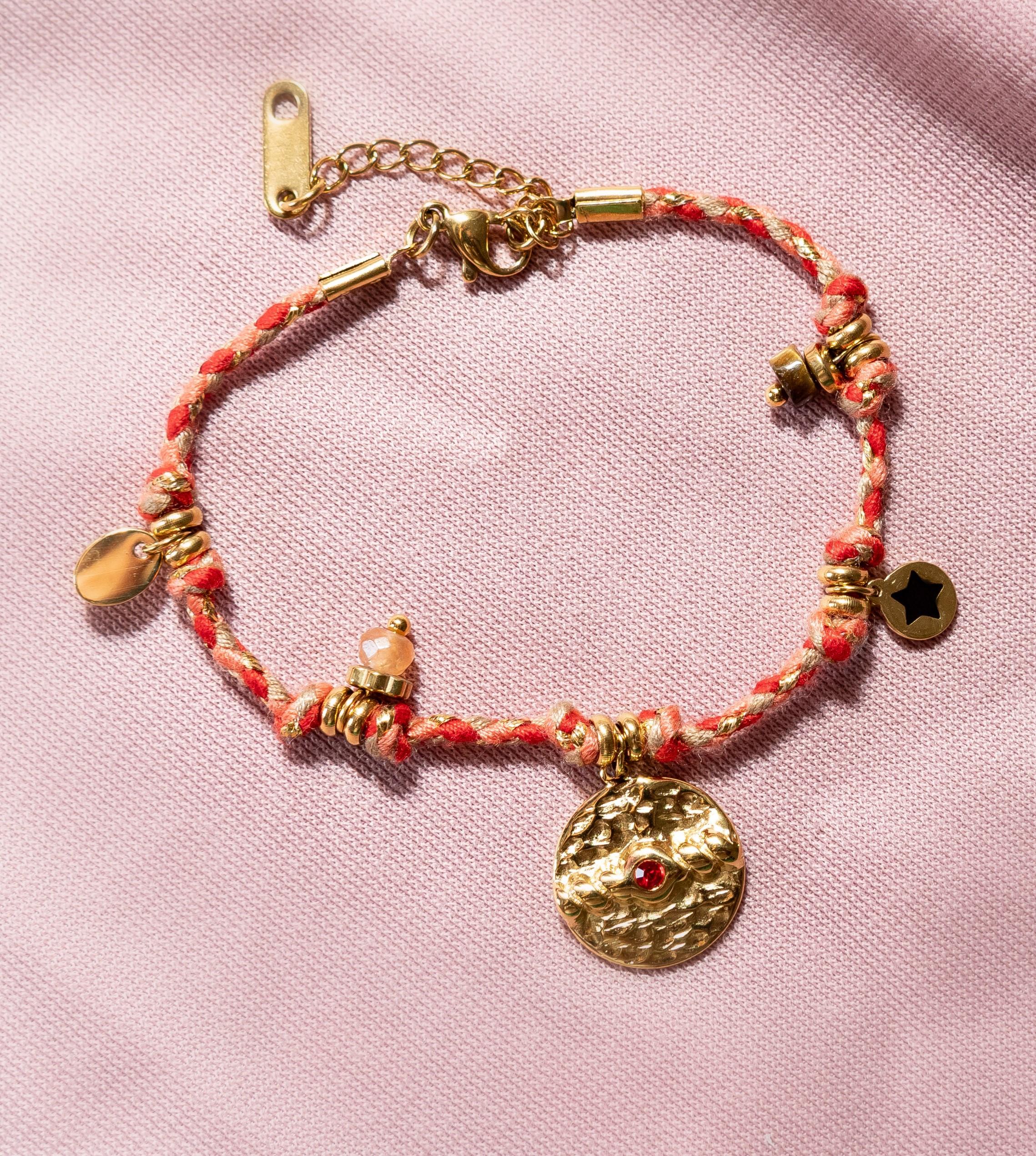 pulsera acero tela color naranja con charms
