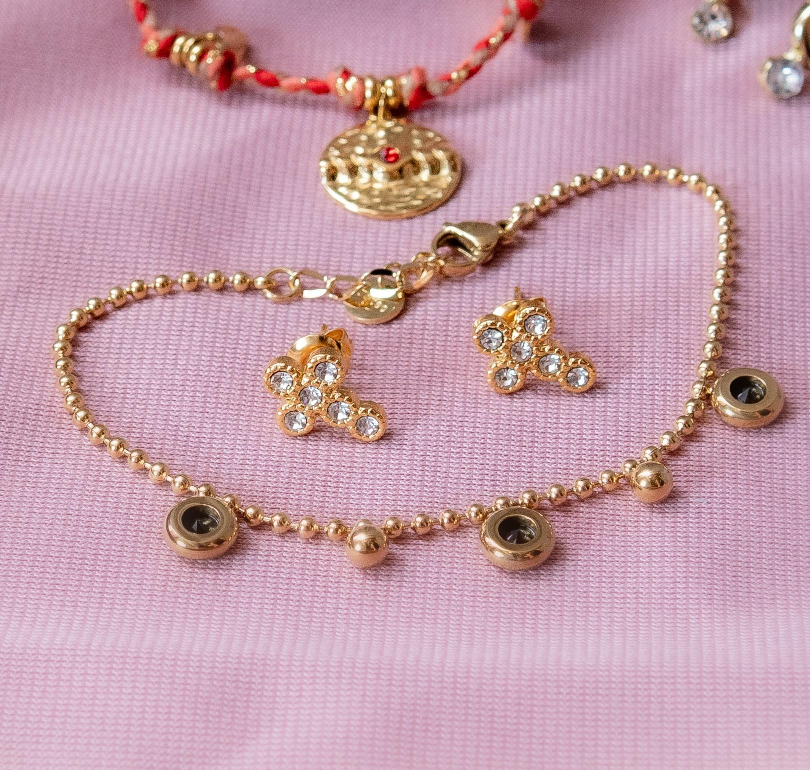 pendientes dorados en forma de cruz con circonitas cristal