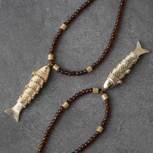 collar cristal facetado con pez articulado acero dorado